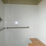 Honeysuckle Bathroom with 60 inch roll in shower and folding seat at Recreational Resort Cottages and Cabins
