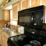 Honeysuckle Kitchen with Hickory Cabinets at Recreational Resort Cottages and Cabins

