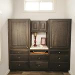 Sundance Model bedroom closets and entertainment center at Recreational Resort Cottages and Cabins in Rockwall, Texas